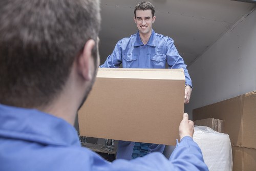 Removal vehicle loading furniture for a home relocation in Maidavale