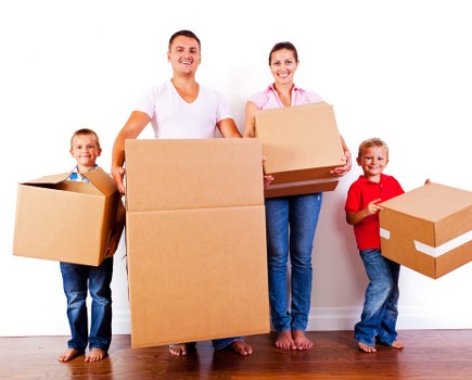 Careful handling of sofas, tables, and bedroom furniture for storage