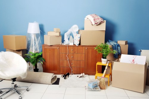 People moving storage items safely in a storage facility