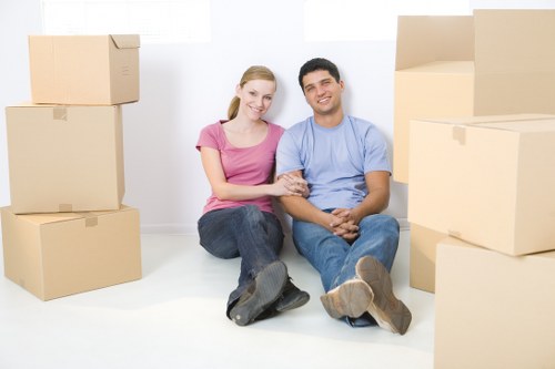 Packed boxes and furniture ready for a Maidavale apartment removal