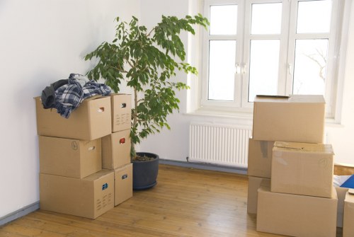 Packing boxes and household items ready for a local small removal in Maidavale