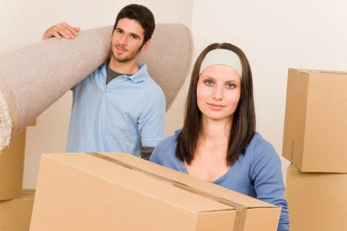 Packed boxes and furniture ready for removals and storage in Maidavale