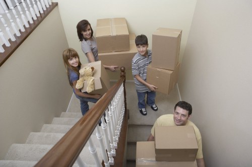 Professional movers planning a flat removal route in Maidavale